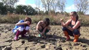 girls-testing-the-muddy-water-in-hunters